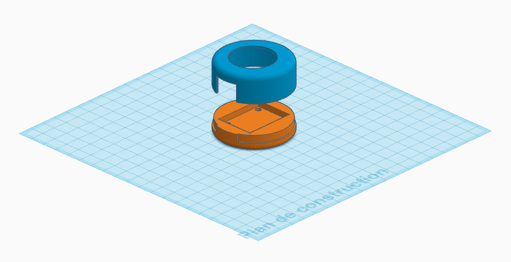 Capture d'écran du logiciel de modélisation 3D Tinkercad présentant le modèle 3D d'un boîtier pour les joystick